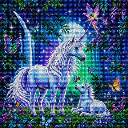 Finished mother and baby unicorn diamond painting with two white unicorns, a fairy, and butterflies in a glowing blue forest under a full moon | Azurra Shop