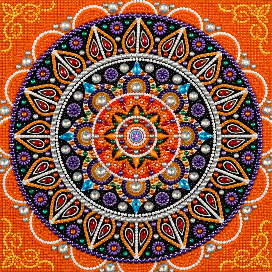 Finished orange jeweled mandala diamond painting with a black and orange medallion, red teardrops, and crystal rhinestones | Azurra Shop