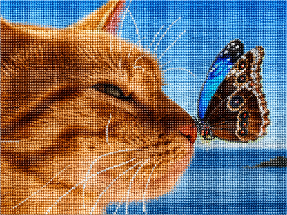 Tan calico cat diamond painting kit close-up – warm tan and orange calico cat with golden eyes gazing upward at a butterfly, rich background, sparkling full drill 5D resin diamond texture — Azurra Shop
