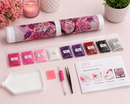 Diamond painting kit supplies including rolled canvas, numbered diamond bags, tray, pen, and tweezers | Azurra Shop