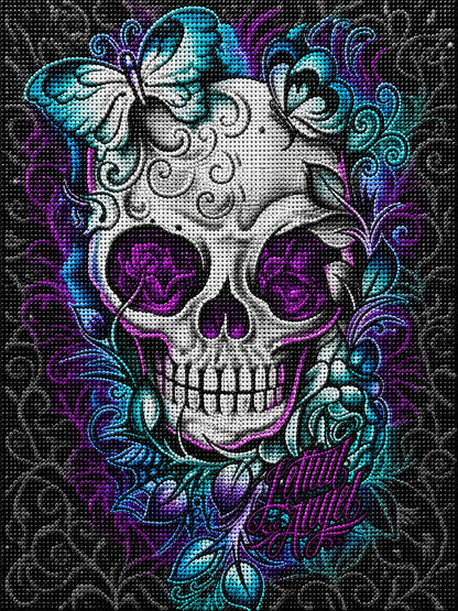 Close up of the finished teal butterfly sugar skull diamond painting with a teal butterfly, purple roses in the eyes, and swirling floral patterns | Azurra Shop
