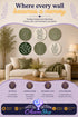 Promotional graphic for a set of six round wooden botanical wall art prints in green, cream, and black tones, arranged in a gallery wall above a beige sofa and console table