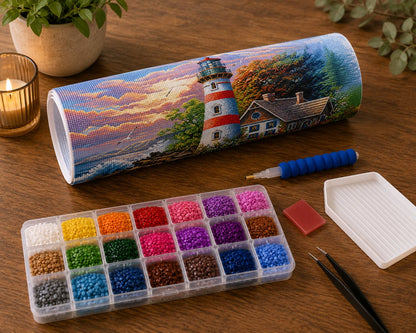 Rolled canvas and supplies for the red striped lighthouse and cottage garden kit, including drill organizer, applicator pen, tweezers, and wax pad | Azurra Shop