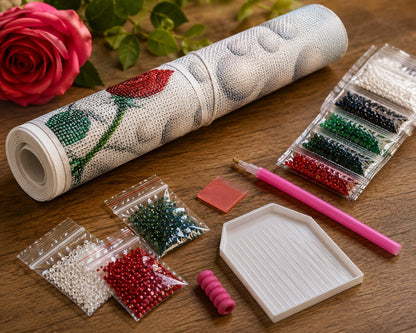 Rolled canvas and full supplies for the red rose and butterfly kit, including diamond bags, applicator pen, and tray | Azurra Shop
