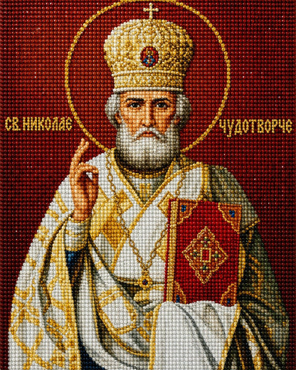 Close up of the finished Saint Nicholas diamond painting, in gold and white vestments with a golden halo