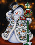Close up of the finished snowman diamond painting wearing a coat with a Christmas village scene and holding a lamppost | Azurra Shop