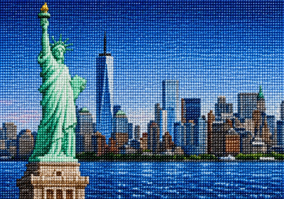 Finished Statue of Liberty diamond painting kit artwork with the Manhattan skyline and blue harbor water | Azurra Shop