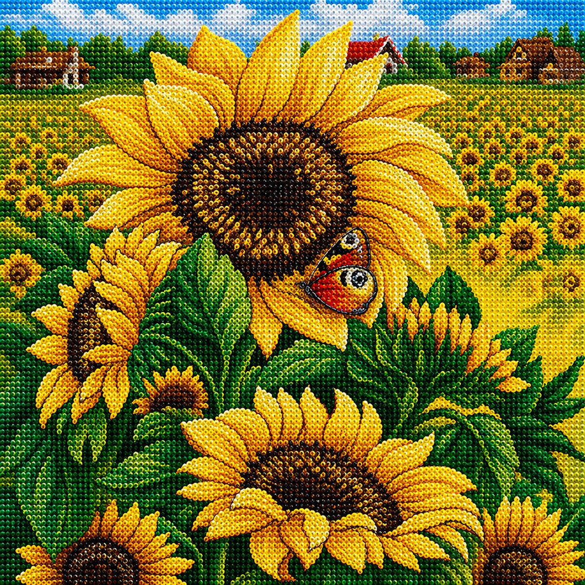 Finished sunflower field and butterfly diamond painting with large sunflowers, a butterfly, and a farm landscape background | Azurra Shop