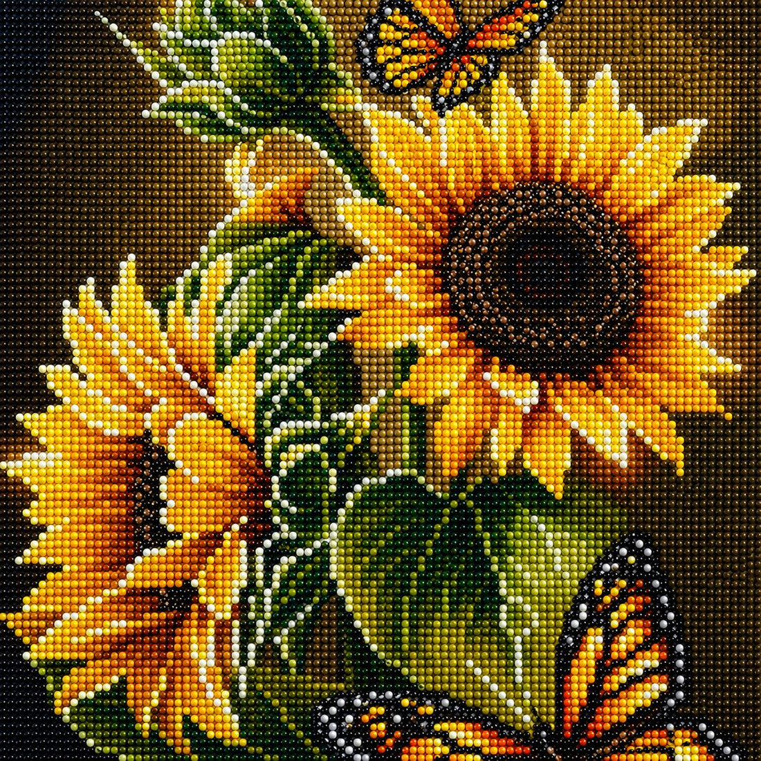 Finished sunflower and butterfly diamond painting with large sunflowers and two monarch butterflies on a dark background | Azurra Shop