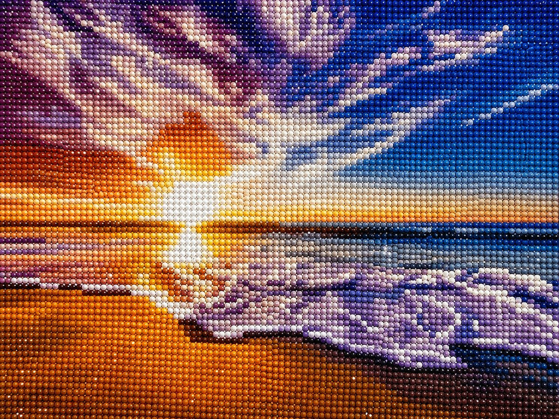 Close up of the finished purple sky ocean sunset diamond painting with sparkling drills | Azurra Shop