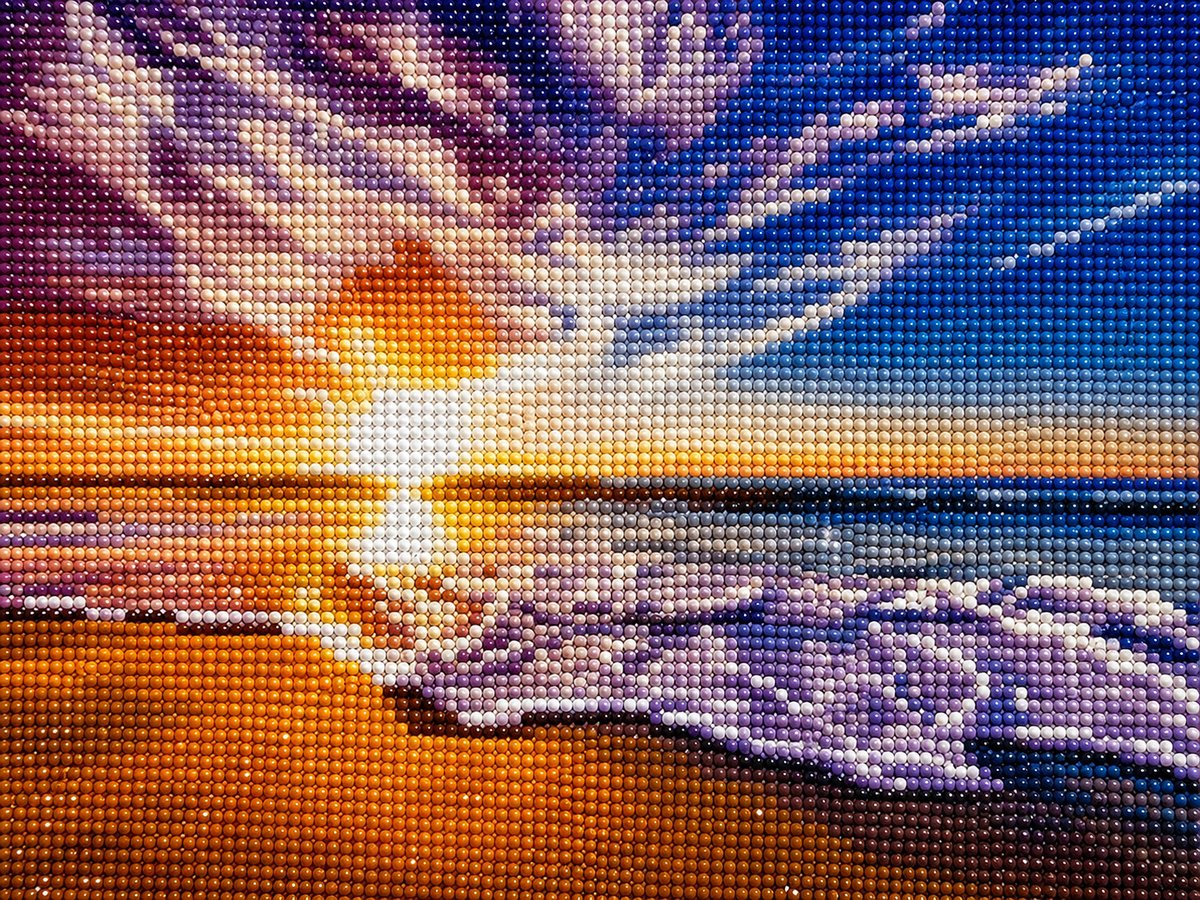 Close up of the finished purple sky ocean sunset diamond painting with sparkling drills | Azurra Shop