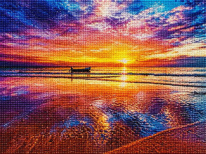 Close up of the finished ocean sunset with a lone boat diamond painting with sparkling drills | Azurra Shop