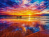 Close up of the finished ocean sunset with a lone boat diamond painting with sparkling drills | Azurra Shop