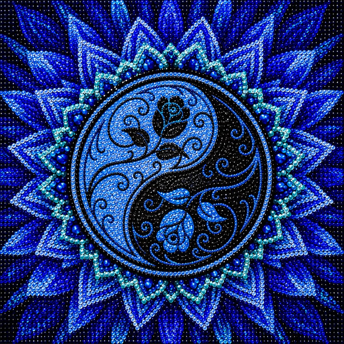 Finished blue yin yang lotus mandala diamond painting with a rose and scrollwork yin yang symbol inside blue starburst petals | Azurra Shop